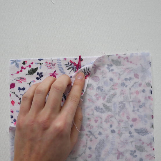 how_to_make_a_buttoned_gift_bag_step-6.jpg?sw=554&q=85