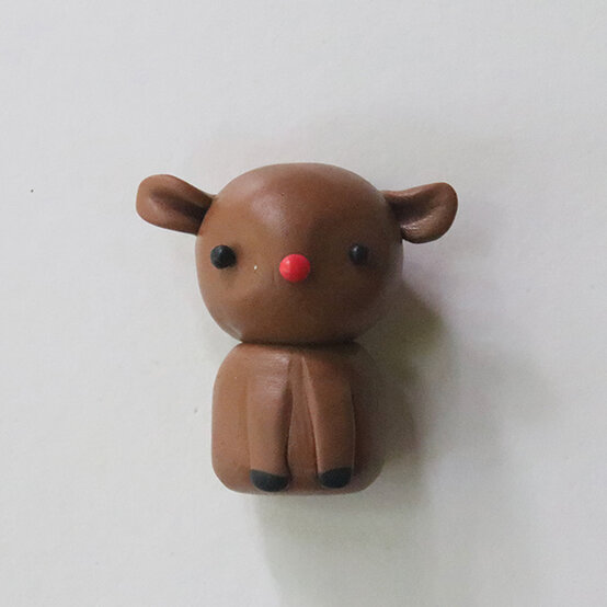 how-to-make-fimo-snow-globes_reindeer-5.jpg?sw=554&q=85