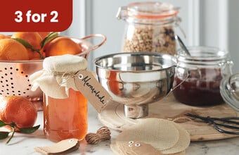 A selection of preserve making products including jars, toppers a funnel and labels. Roundel with 3 for 2. Clicking leads to Preserve Making offers.
