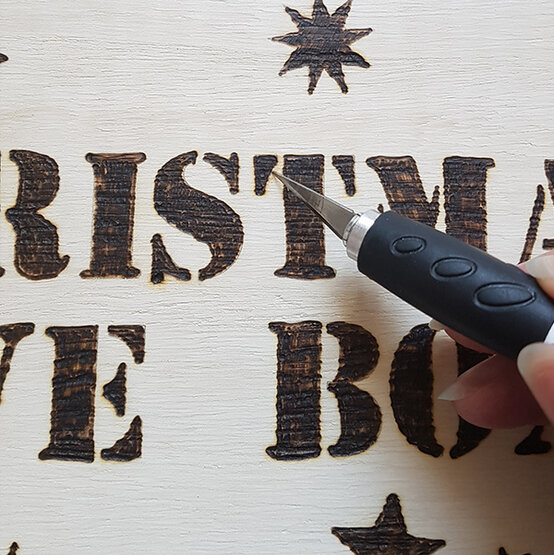 xmas-eve-boxes-pyrography-photo-h.jpg?sw=554&q=85