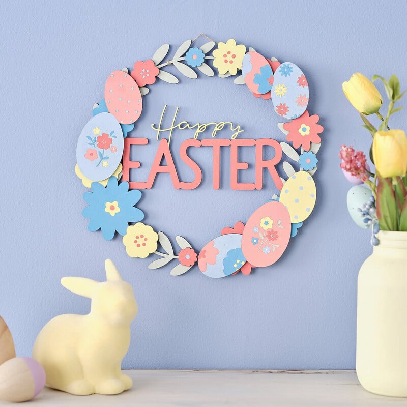 A wooden easter wreath on a wall, with easter decoration on a self below. Clicking leads to all ideas and projects
