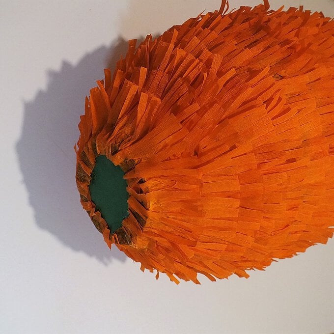 how-to-make-an-easter-carrot-pinata-step-5.JPG?sw=680&q=85