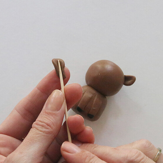 how-to-make-fimo-snow-globes_reindeer-3.jpg?sw=554&q=85