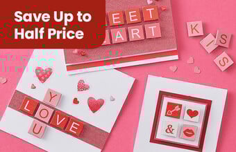 Handmade cards with hearts and scrabble tiles spelling out love you, kiss and sweet heart, with a save up to half price badge. Clicking leads to all valentines day products.