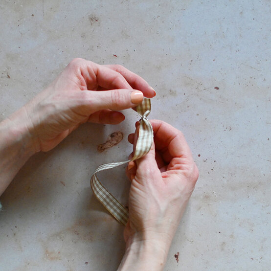 how_to_make_ribbon_charm_bookmarks_6.jpg?sw=554&q=85