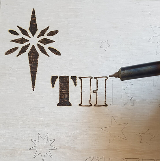 xmas-eve-boxes-pyrography-photo-f.jpg?sw=554&q=85