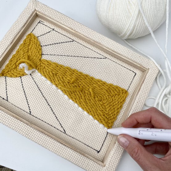 how-to-make-a-punch-needle_sunburst_cream_section-step_11.jpg?sw=554&q=85