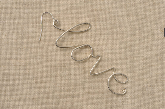 jewellery_writing_earring_5-copy.jpg?sw=554&q=85