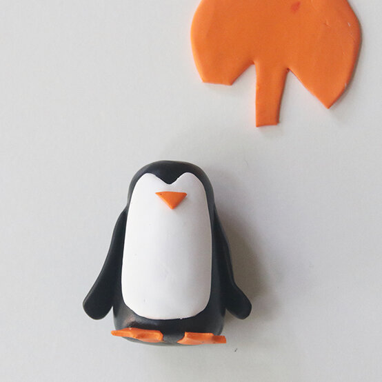 how-to-make-fimo-snow-globes_penguin-5.jpg?sw=554&q=85