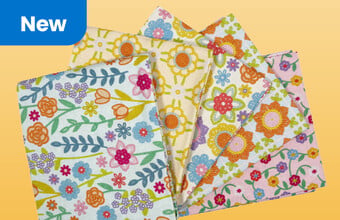 Floral fat quarters. New badge. Clicking leads to new fat quarter packs and fabric.