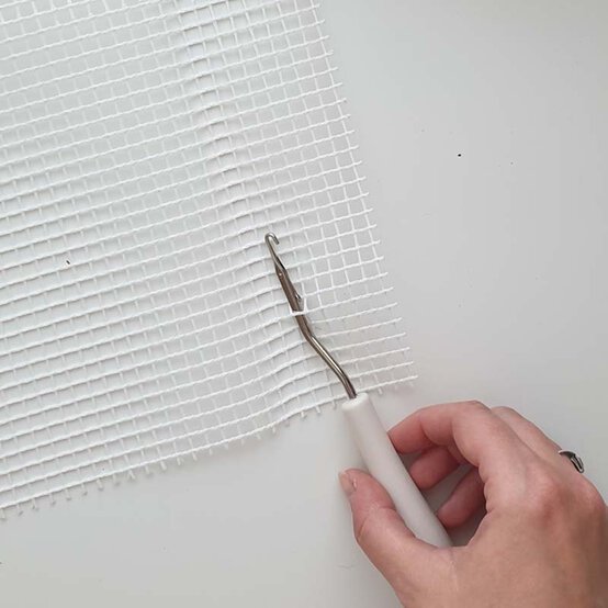 Idea_How-to-Make-a-Halloween-Latch-Hook-Rug-latch-hook-1.jpg?sw=554&q=85