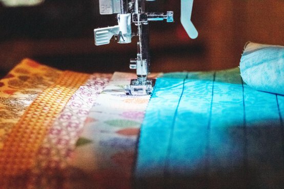 7-sewing-strips-to-fabric-resize.jpg?sw=554&q=85