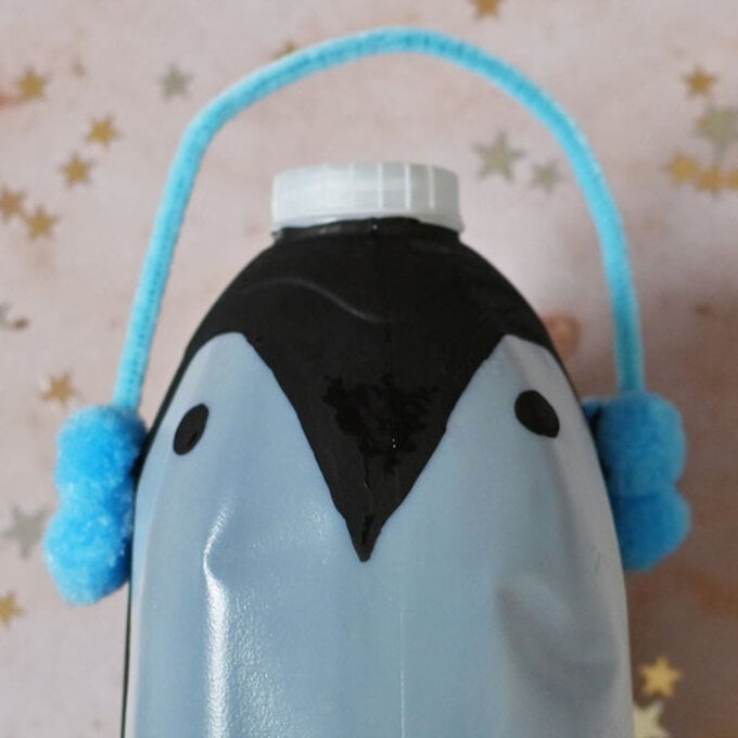 how-to-make-winter-milk-bottle-lanterns_penguin-d.jpg?sw=680&q=85
