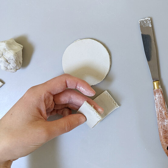 how-to-make-an-air-dry-clay-candle-holder_3.jpg?sw=554&q=85