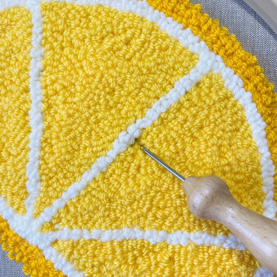 punch_needle_fruit_cushion_neaten_yarn_loops_6.jpg?sw=554&q=85