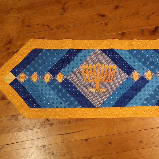 hanukkah_runner_step9_2.jpg?sw=554&q=85