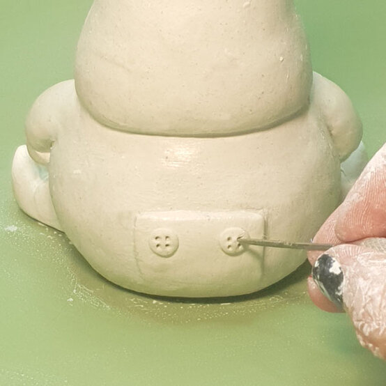 how-to-make-an-air-dry-clay-christmas-gnome_step-13d.jpg?sw=554&q=85