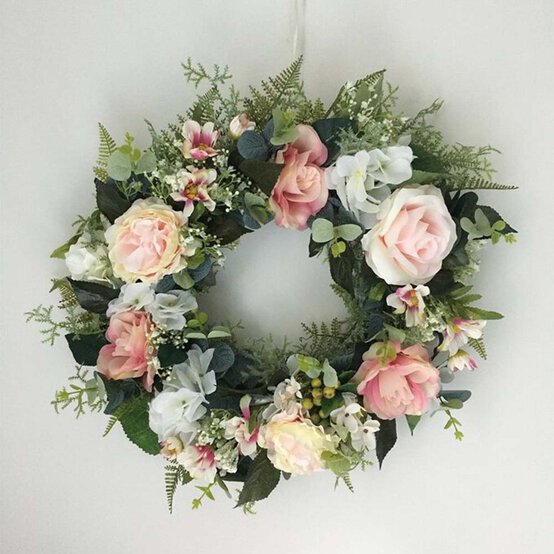 	Idea_how-to-make-a-pink-floral-spring-wreath_step14.jpg?sw=554&q=85