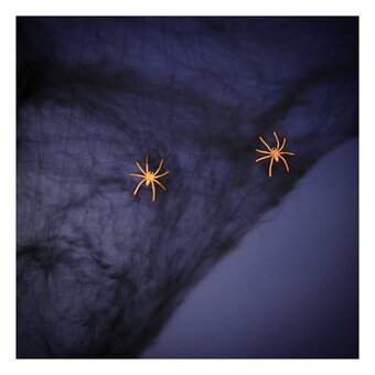Black Spiderweb with Orange Spiders 