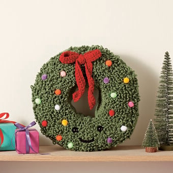 How to Crochet a Christmas Wreath Cushion