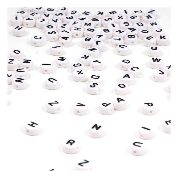 White Round Flat Alphabet Beads with Black Words 3mm x 7mm image number 1