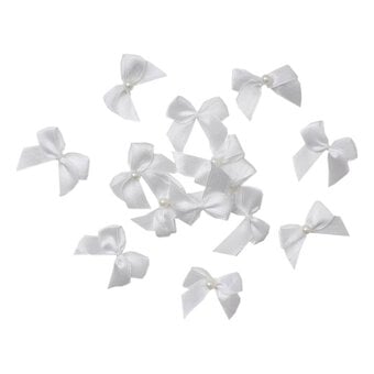 Mini White Pearl Bows 16 Pack
