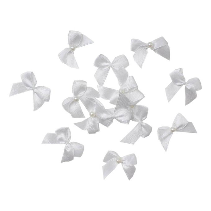 Mini White Pearl Bows 16 Pack image number 1