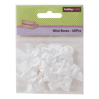Mini White Pearl Bows 16 Pack