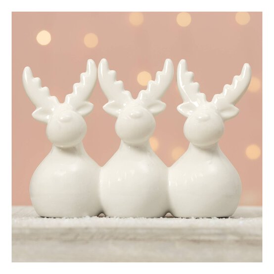 Three Reindeer Sitting Decoration 14cm image number 1