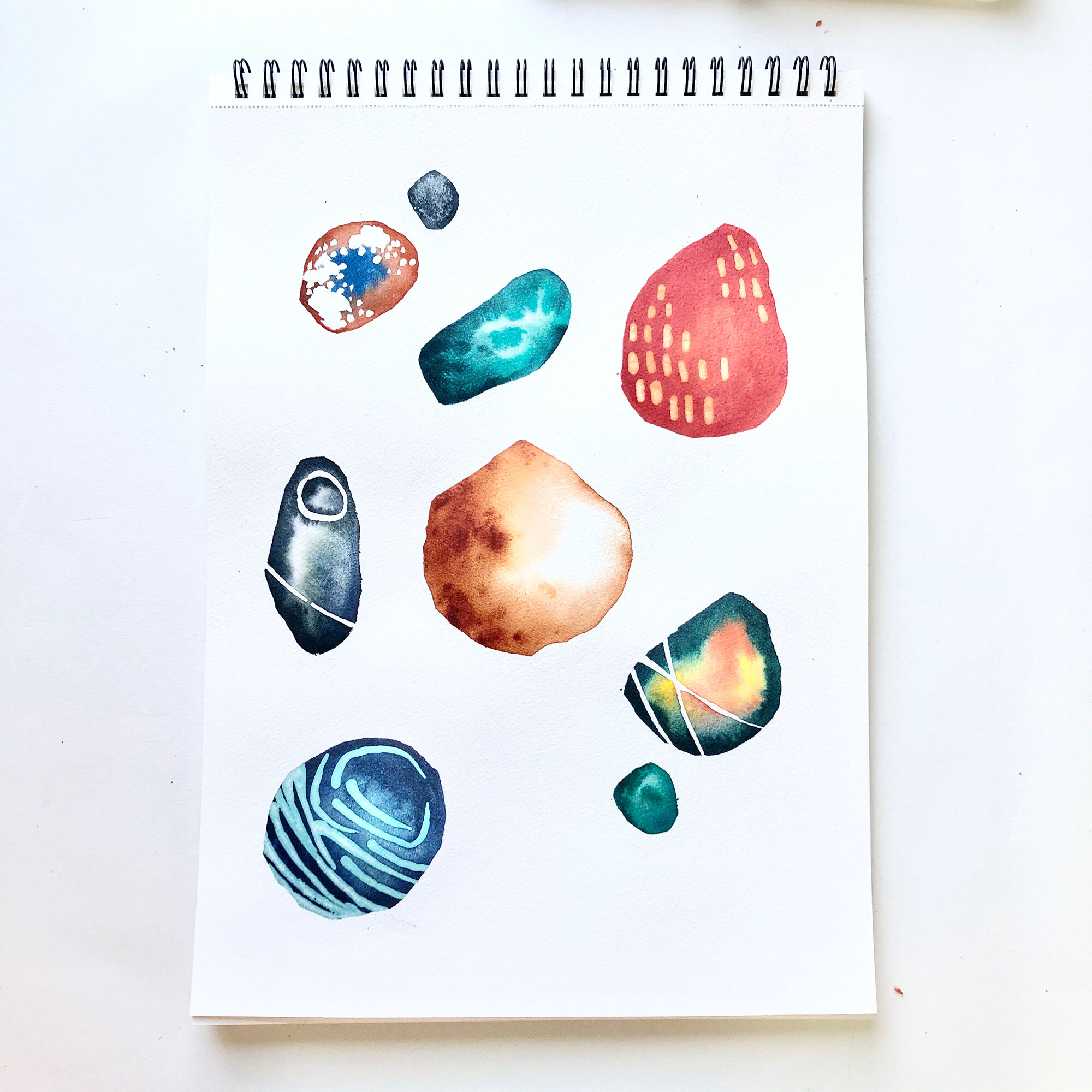 How to Create Abstract Watercolour Pebbles | Hobbycraft