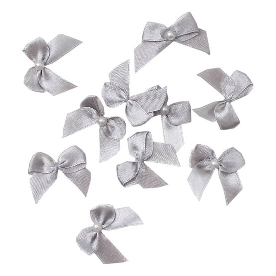 Mini Silver Pearl Bows 16 Pack image number 1
