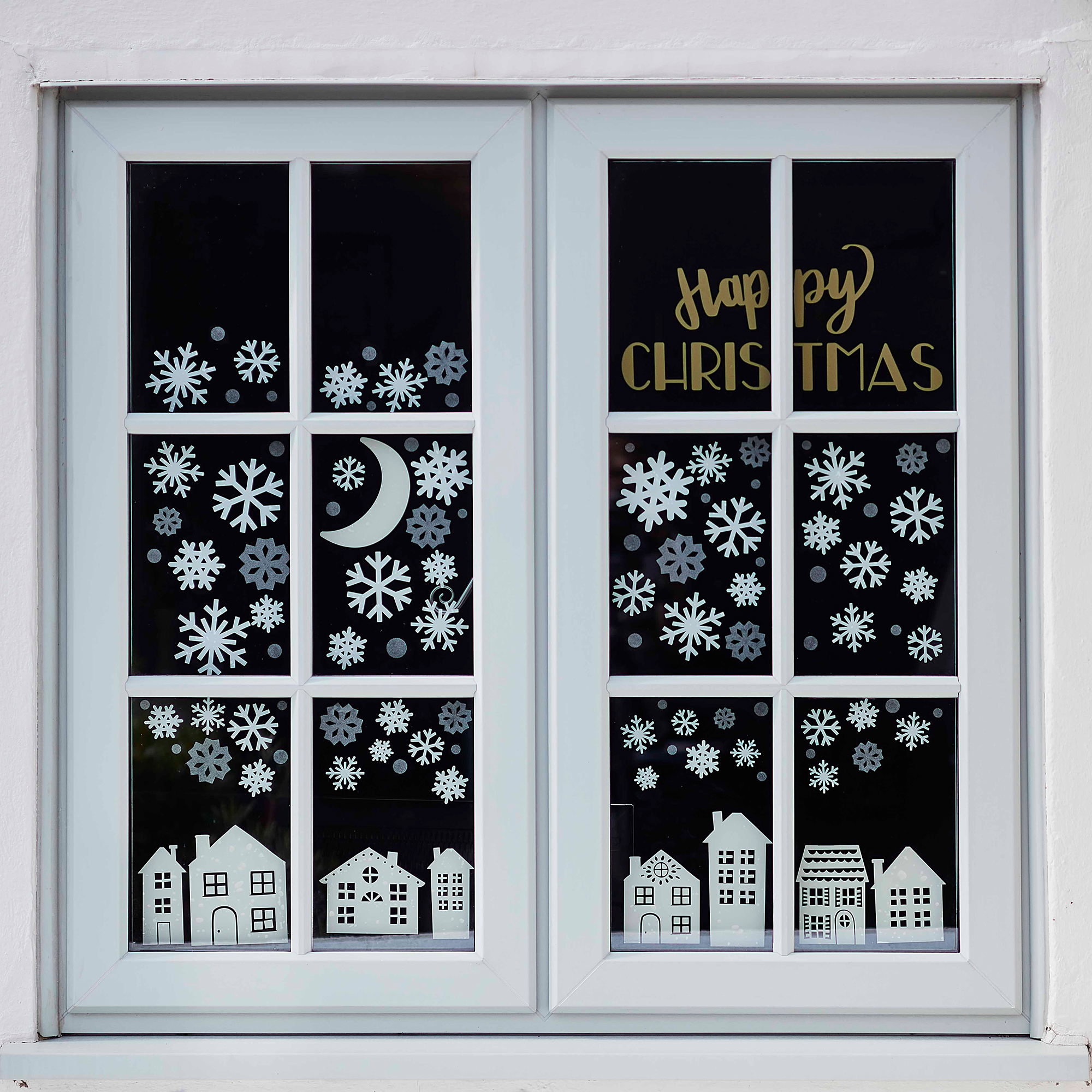 DIY Winter Scene Window Clings Will Brighten Your Outlook